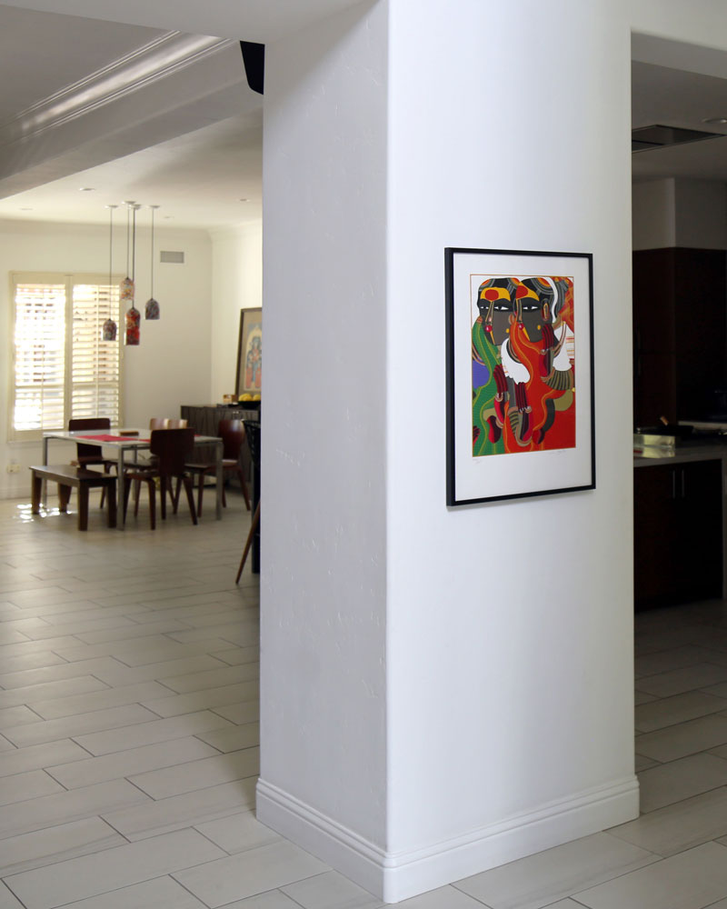 An elegantly framed serigraph by Thota Vaikuntam now hangs in this client’s home.