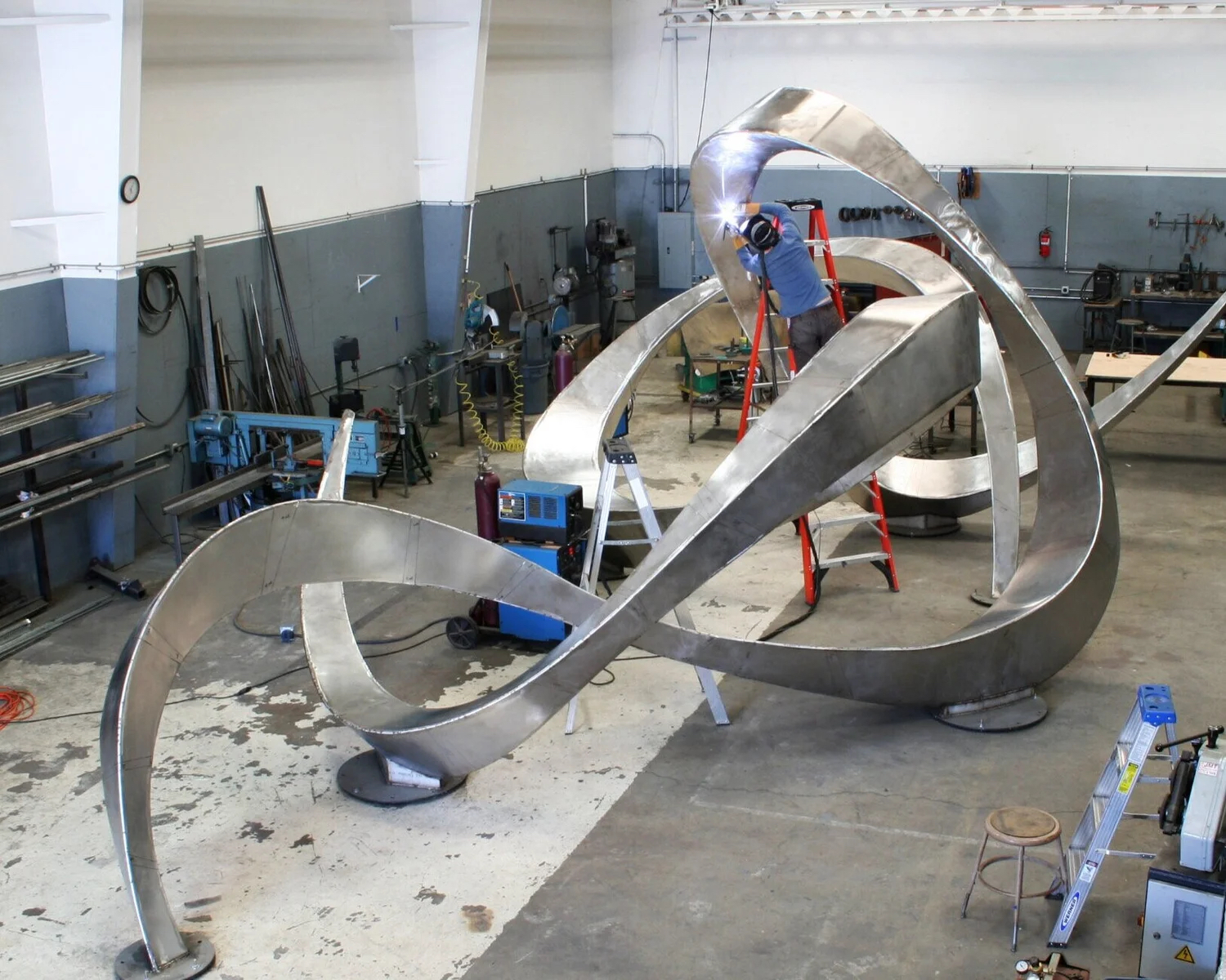 Michael Szabo working on a monumental sculpture in his studio
